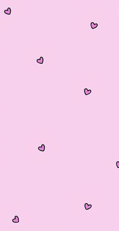 a pink background with small hearts on the bottom and black dots in the middle,