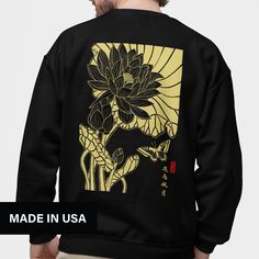 The screen print inspired Japanese botanical sweatshirt features a lotus design, perfect for flower lovers. This Harajuku streetwear oversized unisex sweatshirt combines artistic style with comfort. 𝗗𝗘𝗧𝗔𝗜𝗟𝗦  - Made with a 50% cotton, 50% polyester blend (8.0 oz/yd²) - Comfortable with durable double-needle stitching. - Itch-free; pearlized tear-away label. - Made from 100% ethically grown US cotton - OEKO-TEX-certified dyes for low environmental impact. 𝗖𝗔𝗥𝗘 𝗜𝗡𝗦𝗧𝗥𝗨𝗖𝗧𝗜𝗢𝗡𝗦 - Machine wash: cold (max 30C or 90F) - Non-chlorine: bleach as needed - Tumble dry: low heat - Do not iron - Do not dry clean 𝗛𝗢𝗪 𝗧𝗢 𝗢𝗥𝗗𝗘𝗥 1. Select color option 2. Select size option  3. Select quantity 3. Add to cart  4. Select the desired shipping method 𝗬𝗢𝗨 𝗠𝗜𝗚𝗛𝗧 𝗔𝗟𝗦𝗢 𝗟𝗜? Relaxed Fit Long Sleeve Sweatshirt With Back Print, Artistic Oversized Long Sleeve Sweatshirt, Artistic Graphic Print Sweatshirt For Streetwear, Artistic Cotton Sweatshirt With Graphic Print, Oversized Artistic Sweatshirt With Graphic Print, Artistic Graphic Print Sweatshirt With Relaxed Fit, Oversized Artistic Graphic Print Sweatshirt, Artistic Long Sleeve Screen Print Sweatshirt, Artistic Oversized Crew Neck Sweatshirt