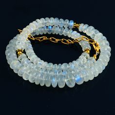 "AAA+ 100% Natural Blue Fire Moonstone Bead Necklace, Rainbow Moonstone Bead 6 To 10.5 MM Necklace 16 Inch Gemstone, Gift For Her, Gemstone Type : Natural ( Untreated& Unheated) Item Code : 9859 Origin-: Rainbow Moonstone Grade-: AA to AAA Stone shape-: Rondelle beads Stone color-: Blue & White Metal-: Length-: 16 Inch Quantity-: 1 Strand Approx Weight : 185.80 Carat Size-: 6 MM to 10.5 MM 100% Genuine & Natural If you want More Quantity in Any Necklace then you can get it in our com Handmade Adjustable Moonstone Beaded Necklace, Moonstone Round Beads Jewelry, Adjustable Moonstone Jewelry With Round Beads, Adjustable Moonstone Beaded Necklace For Gift, Adjustable Beaded Necklace With Natural Moonstones, Adjustable Moonstone Beaded Necklace With Natural Stones, Adjustable Beaded Necklaces With Natural Moonstone, Moonstone Round Beads Jewelry For Healing, Moonstone Jewelry With Natural Round Beads