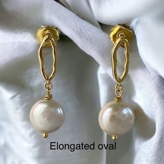 Now on bargain! Last pair! Originally priced at $39.95 now on sale! Pls note No return no exchange on bargain jewelries and will be packaged in a bubble wrap envelope only.  Simple and light coin pearl drop earrings, perfect gift for her, for mom, for your teenager, for a friend, for a teacher or for anyone you care about!  You can't go wrong with this simple jewelry gift for her! The coin pearls are AAA quality, super lustrous! The coin dangling pearls are genuine, white, super lustrous, AAA qu Yellow Gold Oval Pearl Earrings, Elegant 14k Gold Filled Oval Jewelry, Gold Dangle Pearl Earrings As Gift, Minimalist Gold Pearl Earrings Nickel-free, Gold Hypoallergenic Pearl Earrings For Gifts, Minimalist Gold Pearl Earrings Nickel Free, Gold Round Pearl Earrings For Everyday, Minimalist Gold Nickel-free Pearl Earrings, Elegant Handmade Oval Pearl Earrings