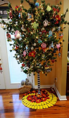 a christmas tree decorated with candy canes and ornaments