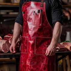 Introducing the Leather Butcher Apron: a fusion of rugged durability and timeless style for the modern-day meat enthusiast! Crafted with premium leather and meticulous attention to detail, our apron is designed to withstand the demands of the butcher shop while exuding sophistication. Butcher Apron, Craft Apron, The Butcher, Butcher Shop, Leather Apron, Apron Pockets, Brass Accents, Professional Look, Functional Design