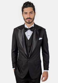 Crafted from a luxurious sharkskin weave wool, the Liberty Black Tuxedo is a sophisticated, statement-making formalwear option. Wide peak lapels in a single button configuration stand out from typical tuxedo styles. Dress to impress with this high-end, premium garment – a modern blend of elegance and refinement. Elegant Single Button Wedding Tuxedo, Classic Black Tie Tuxedo With Lapel Collar, Classic Tuxedo With Lapel Collar For Black Tie, Formal Tuxedo Suit With Pressed Crease, Black Tuxedo With Hidden Button Closure For Party, Classic Semi-formal Tuxedo With Hidden Button Closure, Formal Tuxedo Suit In Suiting Fabric, Classic Semi-formal Tuxedo With Hidden Buttons, Classic Single Button Tuxedo For Formal Events