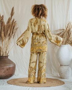 Presenting the Golden Lotus - Short Kimono, a unique piece from our slow fashion collection that's designed to radiate your confidence and individuality. This distinct piece is reversible, displaying meticulous craftsmanship and made-to-order for an opulent appearance that's sure to captivate attention. Size: Our model has the following measurements: Height: 172 cm | 5 ft 7 inches Chest: 88-94 cm | 35-37 inches She is wearing size M kimono with 85 cm | 33 inch length. Golden Lotus, Short Models, Mesh Laundry Bags, Clothing And Textile, Short Kimono, Out Of Shape, Wrinkle Remover, Kimono Jacket, Viscose Fabric