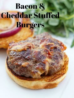 bacon and cheddar stuffed burgers on a bun