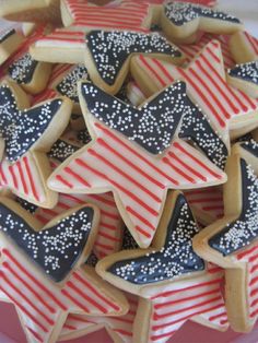 decorated cookies in the shape of stars and stripes