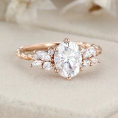 an engagement ring with three pear shaped diamonds