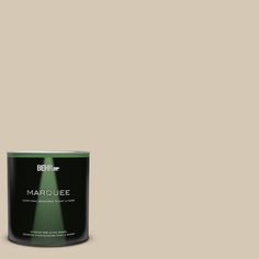 a can of marquee paint on a dark green background