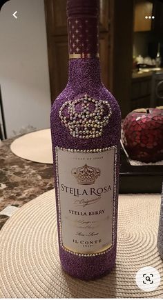 a bottle of wine sitting on top of a table