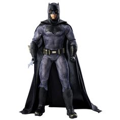 the batman action figure is posed on a white background