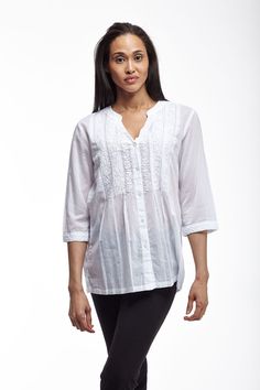 This beautiful top from La Cera is made from 100% cotton fabric that is light enough to breathe but isn't tsheer. Making it a perfect go-to-piece for casual days. There is intricate hand embroidered floral garland between release pleats on front & back bodice and on sleeve cuffs. Additional style details include banded neckline with v-notch, three-quarter length sleeves and a 5-button front closure. 28" length from shoulder to hem (measurements taken from a size M). Style: BlouseMaterial: 100% C Floral Garland, Embroidered Top, Three Quarter, Hand Embroidered, Bodice, Open Shoulder Tops, Tunic Tops, Cotton Fabric, Women's Top