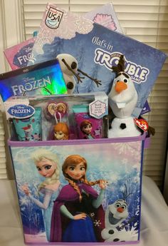 the frozen princess gift basket is filled with toys