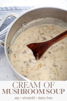 cream of mushroom soup in a pot with a wooden spoon on the side and text overlay that reads, cream of mushroom soup