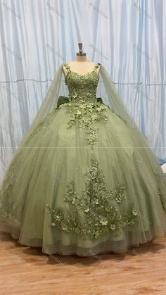 Princess Tiana Green Dress, Princess And The Frog Dress Style, Quince Sage Green Dress, Sage Green 15 Dress, Wedding Dresses Sage Green, Sage Green Debut Theme, Princess Tiana Inspired Dress, Sage Green Dress Quinceanera, Sage Green And Gold Quinceanera Dresses