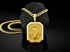 Your solid gold Miraculous Virgin Mary Medallion is stylish and pretty ideal for everyday use. Engraving details of handmade solid gold necklace are very detailed and eye-catching. This meaningful necklace with high quality handwork will be a legacy you can leave to your family with its quality ★Item Details * Material : 10K & 14K & 18K Solid Gold * Chain Model : 3,75mm Solid Gold Cuban Chain * Pendant Weight : 10K = 08.20 Grams 14K = 09.90 Grams 18K = 11.40 Grams * Chain Weight : 14K = Gold Virgin Mary Medallion Charm, Gold Virgin Mary Medallion Jewelry, Gold Virgin Mary Medallion, Gold Medallion With Virgin Mary, Gold Crucifix Jewelry For Commemoration, Yellow Gold Crucifix With Miraculous Medal, Gold Virgin Mary Pendant Necklace, Gold Virgin Mary Necklace Gift, Spiritual Yellow Gold Necklace With Miraculous Medal