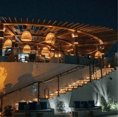 a building with stairs lit up at night