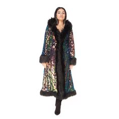 This long winter coat is stylish, soft, and warm yet simultaneously lightweight and easy to wear. The perfect coat to get you ready for your next festival or night out on the town. This Baroness Black Faux Fur & Deep Sea Sequin Coat is locally made from high-quality fabrics right here in San Francisco and is unisex. The sequin pattern shifts in the light to reveal a spectrum of colors from greens, yellows, and deep blue as you move and is perfect for your next festival! Be sure to follow us Winter Party Fur Coat With Faux Fur Trim, Long Winter Outerwear With Faux Fur Trim, Fall Party Long Fur Coat, Long Winter Fur Coat With Faux Fur Trim, Hooded Fall Party Outerwear, Long Coat For Fall Party, Long Winter Party Outerwear, Long Fall Party Outerwear, Festival Coats