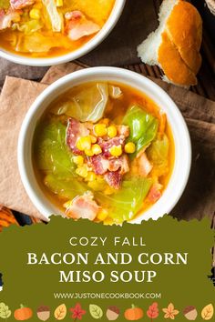 two bowls of bacon and corn miso soup on a table with bread in the background