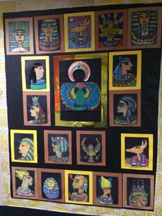 an egyptian themed wall hanging with pictures and masks on it's sides, all in different colors