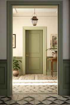 an open door leading into a room with tiled floors