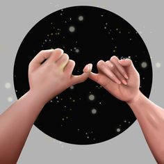 two hands reaching out towards each other in front of a black circle with gold dots