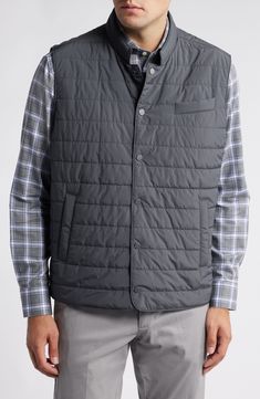 Comfortable and versatile, this classic puffer vest features magnet-secured front pockets and a lightweight feel that layers over or into your favorite cool-weather looks. Front snap closure Stand collar Chest welt pocket; front snap-welt pockets; interior zip pocket Lined, with fill 100% polyester Dry clean Made in Turkey Classic Sleeveless Outerwear For Outdoor, Casual Nylon Vest With Functional Pockets, Gray Casual Vest With Pockets, Casual Gray Vest With Pockets, Casual Fall Vest With Functional Pockets, Casual Cold Weather Vest With Pockets, Functional Vest With Pockets For Cold Weather, Casual Winter Vest With Functional Pockets, Casual Gray Puffer Jacket With Pockets