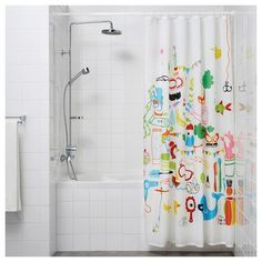 the shower curtain is decorated with colorful images on it's side and features an animal theme