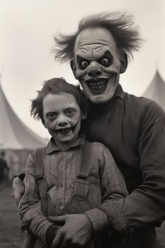 a man and child dressed up as scary clowns