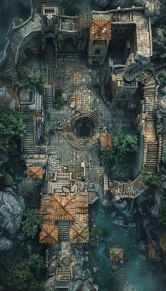 an aerial view of a building surrounded by trees and rocks, with stairs leading up to the entrance