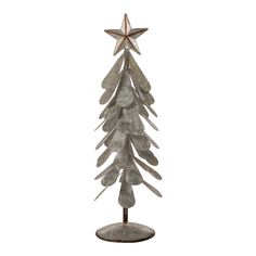 a metal christmas tree on a stand with a star hanging from it's top