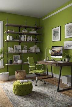 an office with green walls and furniture