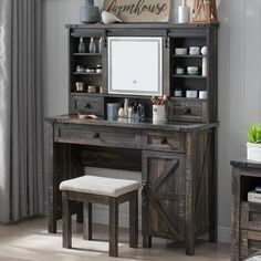 a wooden desk with a mirror and stool