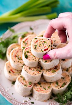 a person is dipping some food on top of it