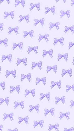 purple bows on a white background for wallpaper or fabric, all in different sizes and colors