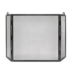 a black fireplace screen with an iron frame and mesh design on the front, against a white background