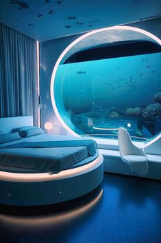 a bed room with a large window and a fish tank