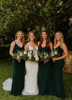 the bridesmaids are all wearing green dresses and holding bouquets in their hands