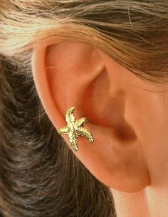 "Ear Charms® Fun Starfish Ear Cuff Non-Pierced Side Cartilage Non-pierced Earring Crawler - Reminiscent of the Seaside & Reminds Us of Summer. Solid Sterling Silver 925 Starfish, Also available in Yellow Gold or White Rhodium over the Sterling Silver for a Carefree Finish. Fully Adjustable, Comfortable & Secure Carry or Gift Box to keep them in & Simple Instructions Included. Ear Charms® Inc. 1982 - 2021 / Sandra Callisto designer (Hand carved & cast using the \"Lost Wax Method\" Adjustable Summer Ear Cuff As Gift, Trendy Summer Star-shaped Jewelry, Gold Star Earrings For Summer, Summer Star-shaped Jewelry For Pierced Ears, Nickel Free Starfish Jewelry For Summer, Ear Cuff Earrings, Wrap Earrings, Jewelry Beautiful, Climber Earrings