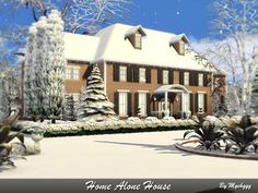 a house is shown in the winter with snow on the ground and trees around it