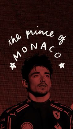 a man standing in front of a red background with the prince of monaco written on it