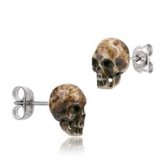 PRICES MAY VARY. The hand carved bone skull is .45 inches tall with a standard small piercing hole size of 20 ga (0.8 mm). The metal component is made from 316L surgical steel. These skull earrings are for everyday punk rock, emo, goth, or hardcore inspired looks. They are also great for Halloween costumes such as skeleton, zombie, or evil witch. These unique post earrings make a great gift for men, women, or teen boys and girls Skulls are made from animal bone. Sustainable bone material is sour Different Types Of Earrings, Rings Gothic, Skeleton Jewelry, Gothic Skeleton, Girl Skull, Mens Earrings Hoop, Magnetic Earrings, Types Of Earrings, Lynyrd Skynyrd