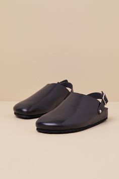 The sleekest and chicest everyday looks always include the Seychelles Buckle Up Black Leather Slingback Slip-On Clogs! Smooth genuine leather shapes a clog-inspired upper with a rounded toe and a slingback-style strap with an adjustable silver buckle and matching studs at the instep and outstep. The slip-on design makes for effortless styling, while a contoured, suede leather insole makes for a comfortable wear! 1" Heel. Smooth insole. Rubber sole has nonskid markings. Genuine leather upper, bal Flat Clogs, Seychelles, Leather Flats, Style Guide, Strap Heels, Everyday Look, Suede Leather, Style Guides, Clogs