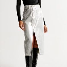 High Rise Midi Skirt Denim Fabric With A Silver Metallic Coating Front-Slit Detail Functional Front And Back Pockets Front Zipper Closure Size 31 Nwt Midi Skirt Denim, Denim Midi Skirt Outfit, Cargo Midi Skirt, Tulle Maxi Skirt, Midi Skirt Outfit, Tulle Midi Skirt, Stretchy Skirt, Skirt Denim, Eve Outfit