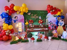 a birthday party with balloons and decorations