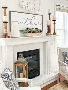 a living room filled with furniture and a fire place in front of a sign that says gather