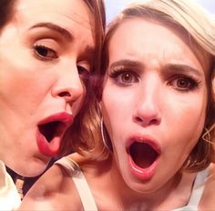 two women with their mouths open and one has her tongue out while the other looks surprised