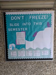 a sign on the side of a building that says don't freeze slide into this semester