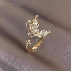 Adjustable Cubic Zirconia Flower Ring For Promise, Butterfly-shaped Open Metal Ring For Wedding, Sparkling Open Ring For Party, Adjustable Sparkling Rings For Wedding, Adjustable Crystal Diamond Ring, Adjustable Cubic Zirconia Diamond Ring For Party, Adjustable Dazzling Cubic Zirconia Rings, Dazzling Adjustable Cubic Zirconia Rings, Adjustable Cubic Zirconia Butterfly Open Ring