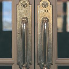 an image of a door handle with the words pull on it