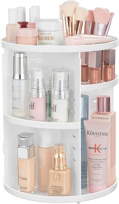 PRICES MAY VARY. LARGE CAPACITY - The HBlife 360 rotating organizers and storage can hold at least 30 makeup brushes, 20 skincare products, hair accessories, and other beauty and bathroom supplies. The 360-rotating designs allow you to grab what you need quickly. PERFECT DESIGN - HBlife adjustable cosmetic display case maximizes your storage needs. The trays can design at a height to fit various sizes of cosmetics and accessories. It will approve by your vanity and bathroom. DIY your charming sp Makeup Organizer Countertop, Spinning Organizer, Rotating Makeup Organizer, Penyimpanan Makeup, Perfume Organizer, Perfume Organization, Care Organization, Cosmetic Display, Skincare Organization